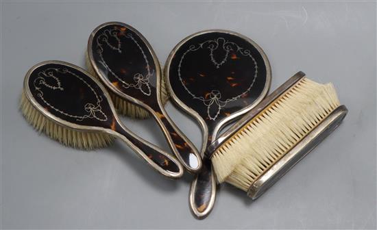 A 1920s silver and tortoiseshell five piece mirror and brush set by Mappin & Webb.